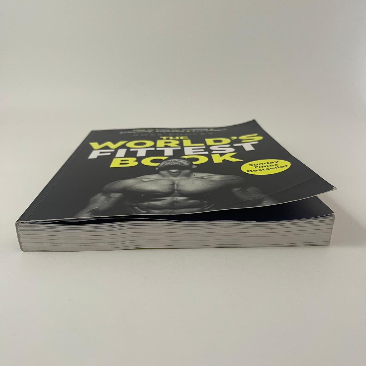 Book titled 'The World's Fittest Book' on a white background