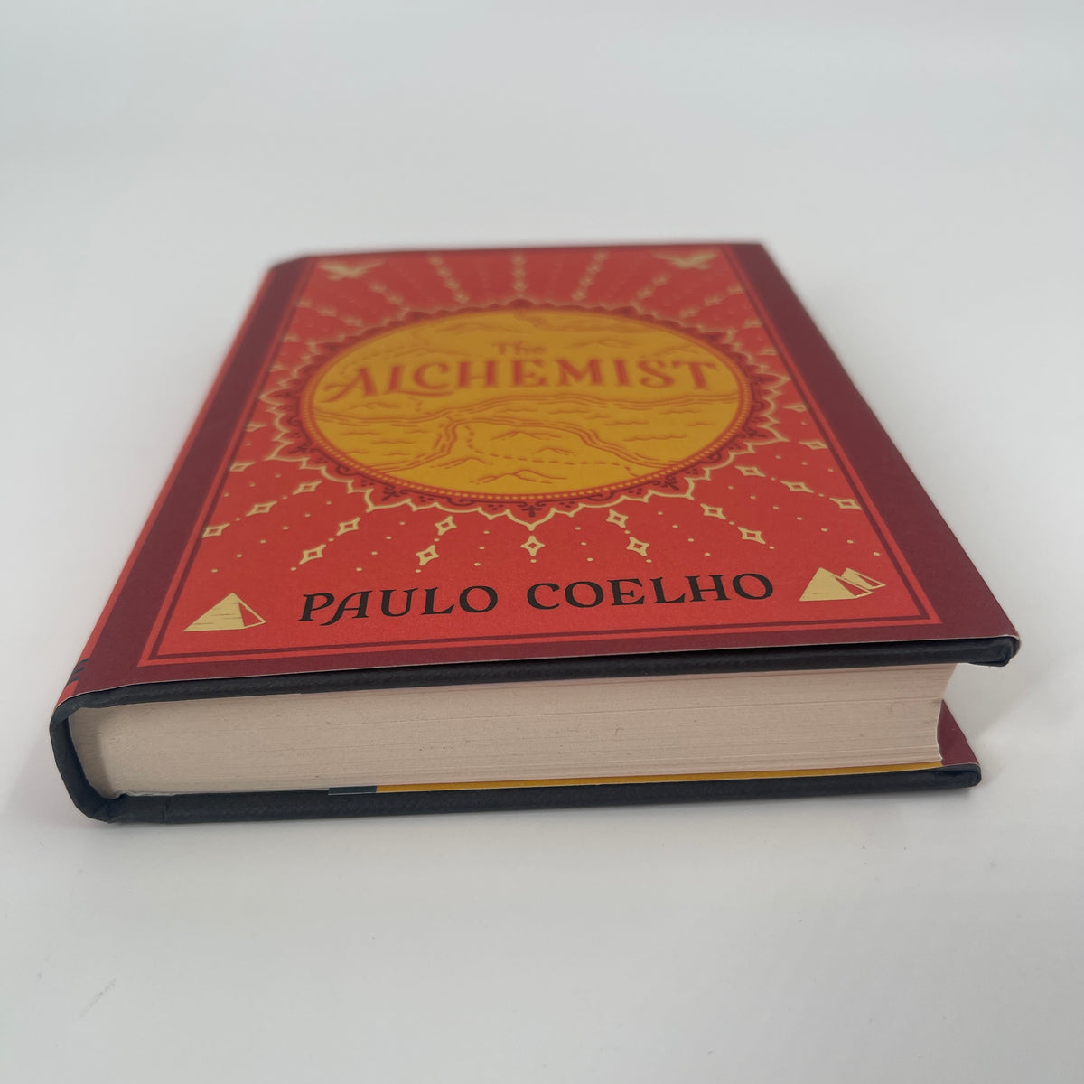 The alchemist: a fable about following your dream - Paulo Coelho - Bottom Edge