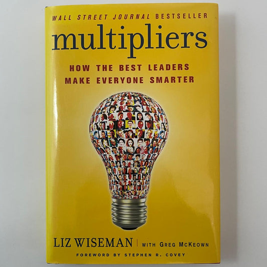 Book titled 'Multipliers' with a yellow cover and light bulb graphic on a white background